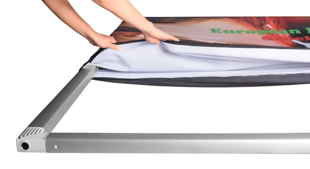 Expand-GrandFabric-Hands-Putting-Fabric-on.webp